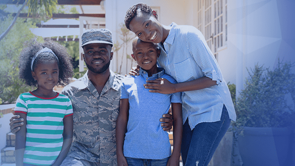 military family of four smiling together